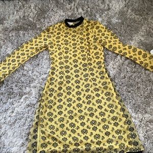 yellow and black tunic top